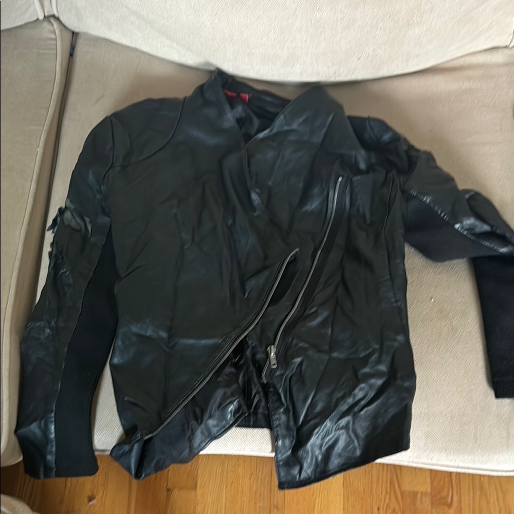 Black Asymmetrical Leather Jacket has rip on arm showed in pic